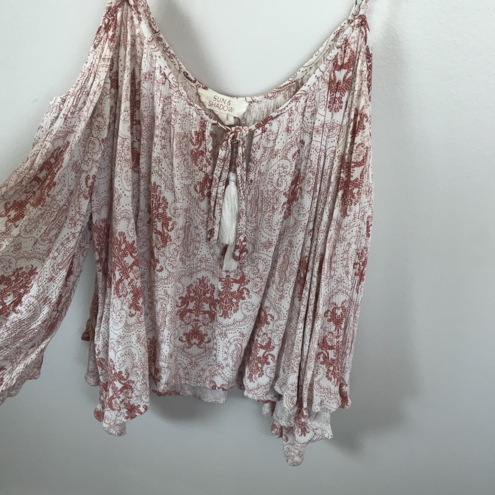 Long sleeve, off the shoulder blouse.